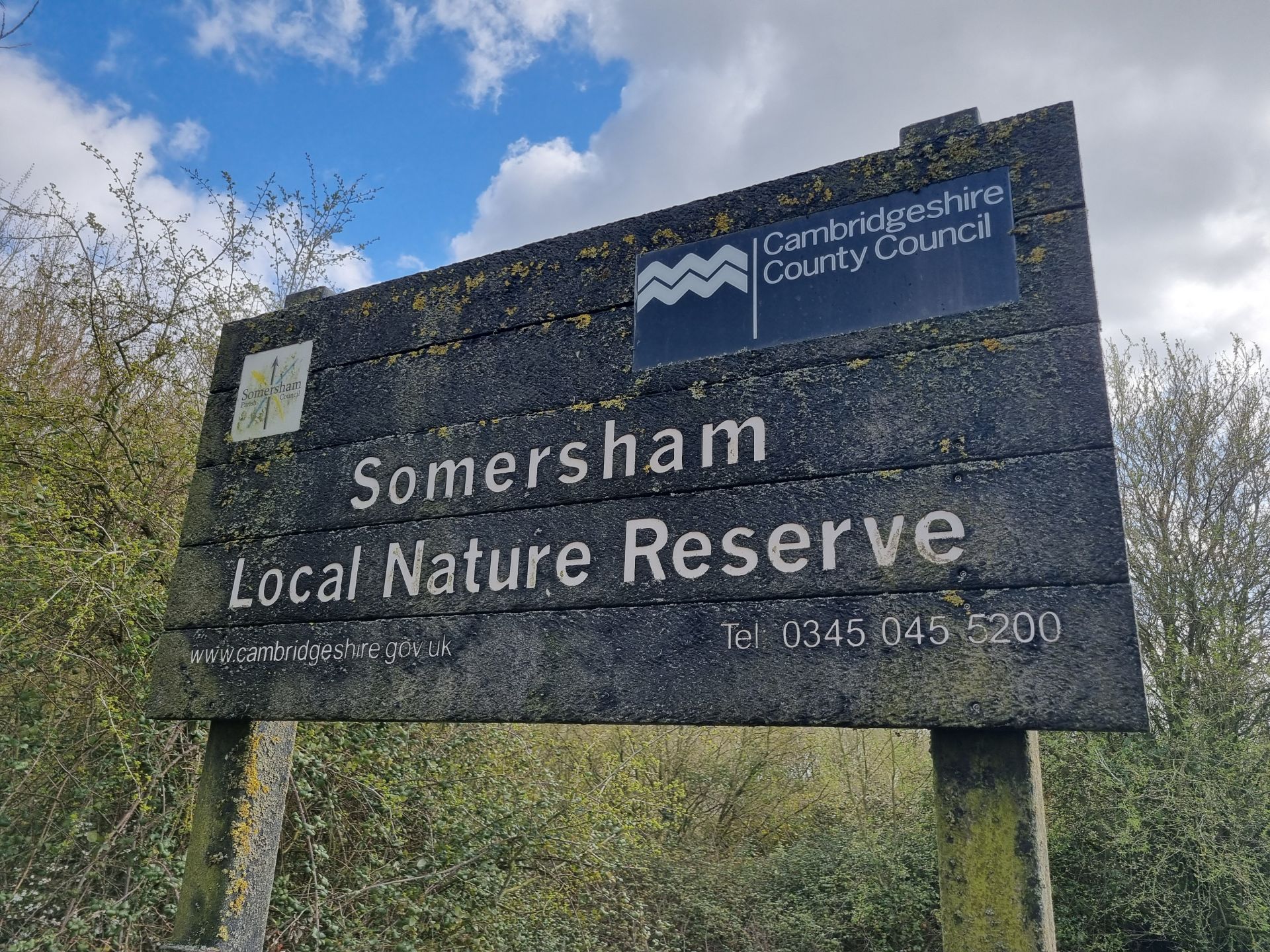 a simple sign announcing entrance to the somersham nature reserve